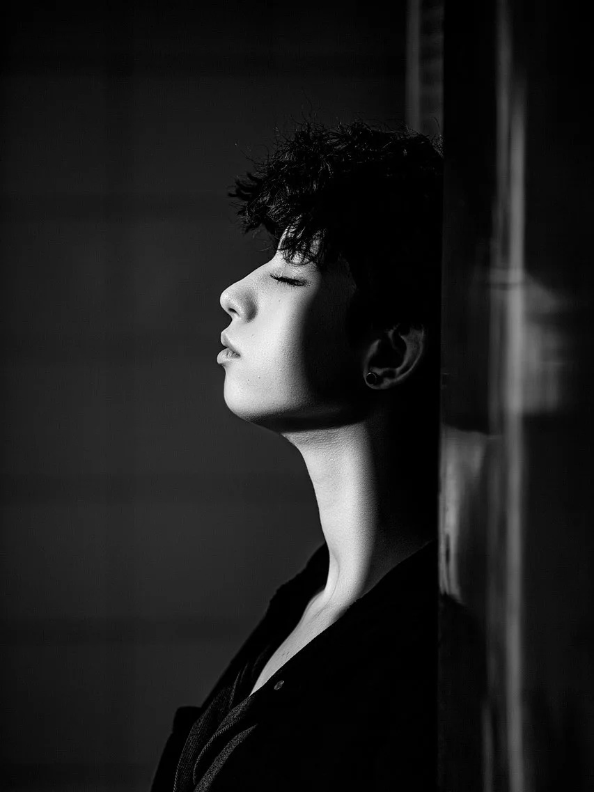 High-contrast side profile portrait of a man