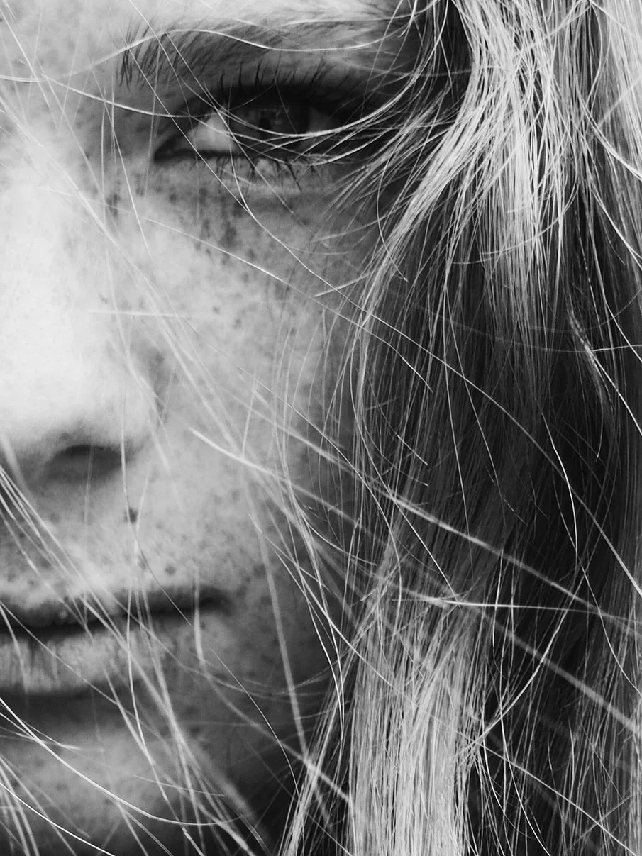 Close-up monochromatic portrait of a woman